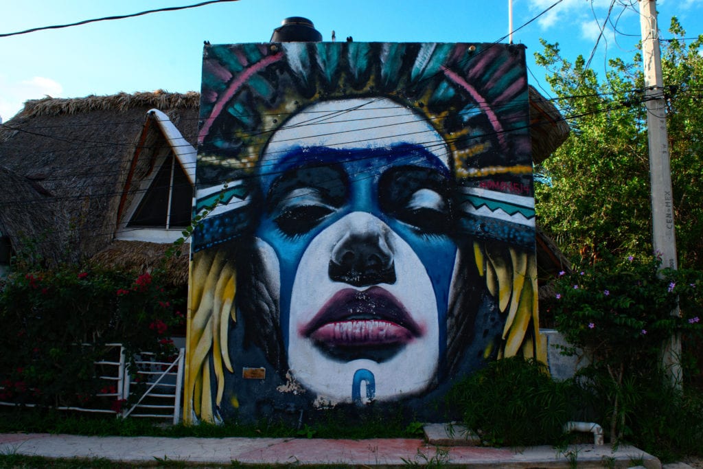 mural in isla holbox mexico depicting a woman's face