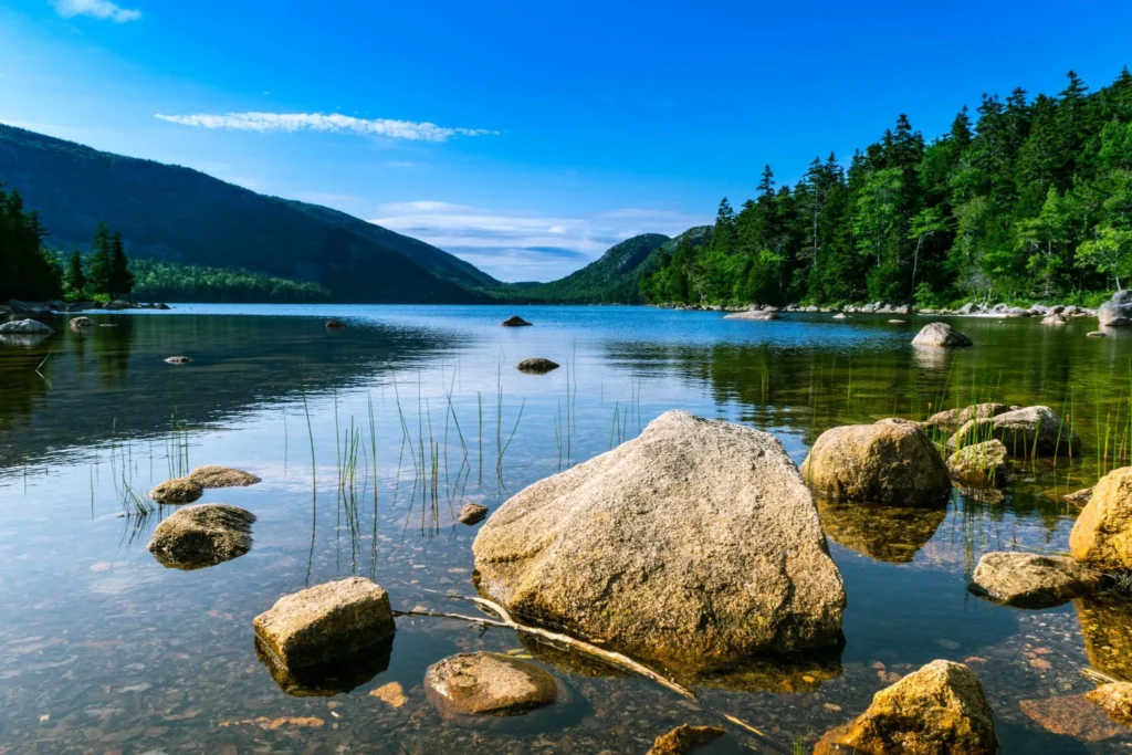 view of jordan pond from the shore, as seen when visiting acadia national park in maine