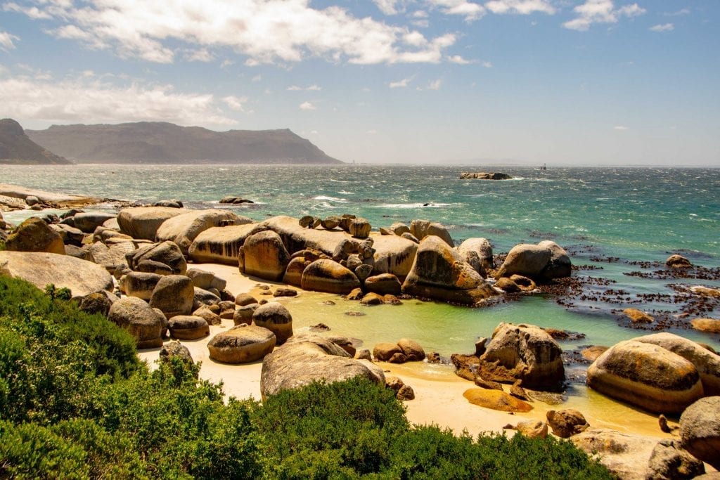 boulders beach south africa as seen from the trail above it on a sunny day