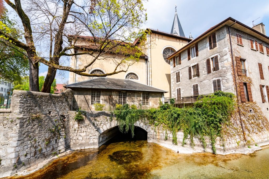 canal in annecy france traveling underneath annecy cathedral