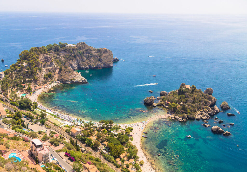 view of isola bella in taormina sicily as seen from above