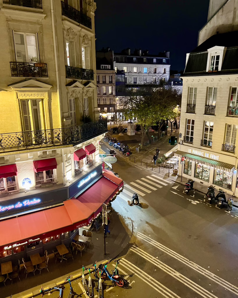 view of a quiet street in paris at night from above at hotel bastille speria