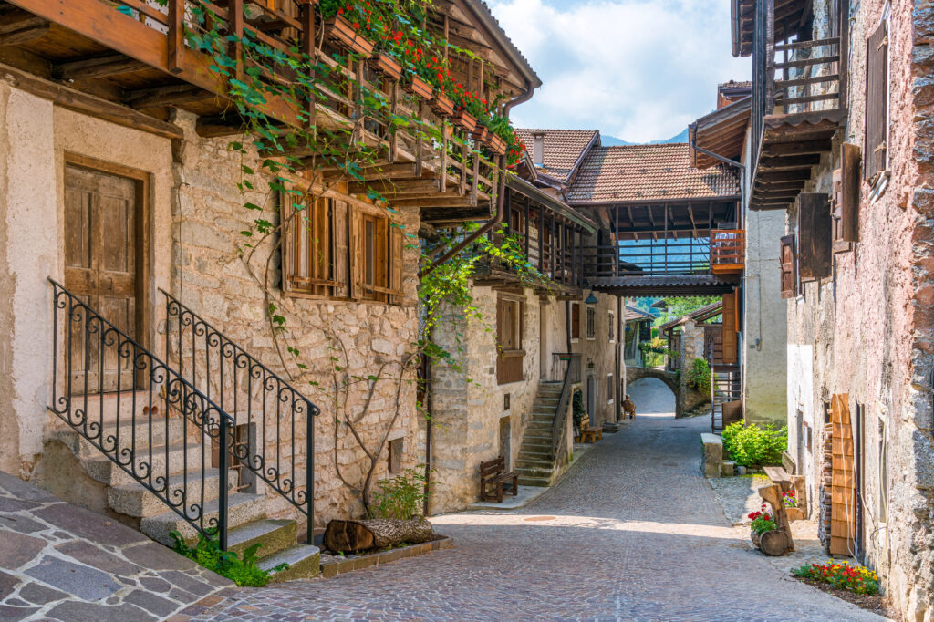 narrow street in rango italy lined with residential homes