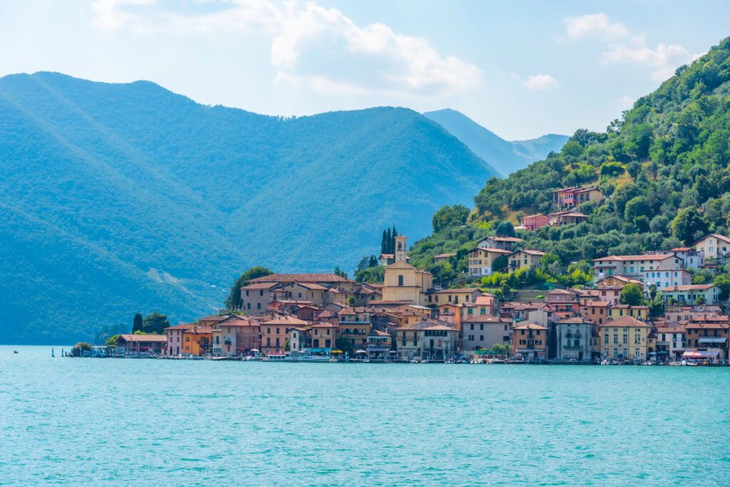 view of Peschiera Maraglio from the water on lake iseo italy