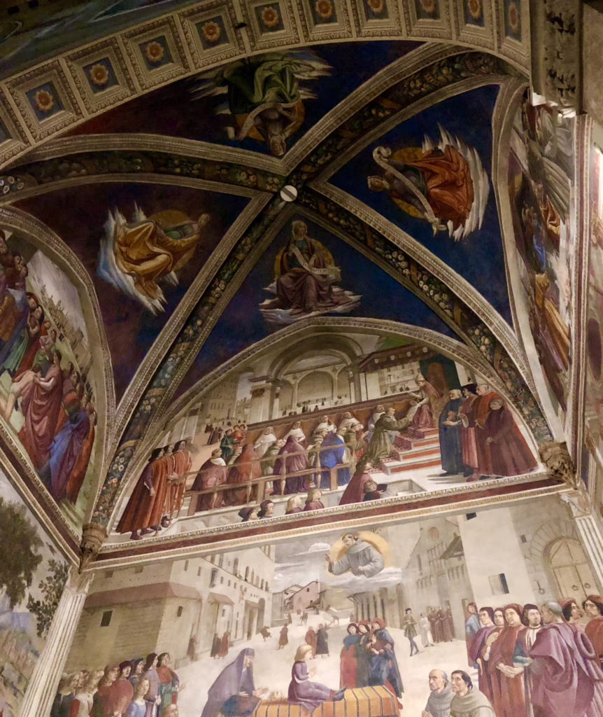 colorful frescoes inside the church of santa trinita, one of the best hidden gems in florence italy