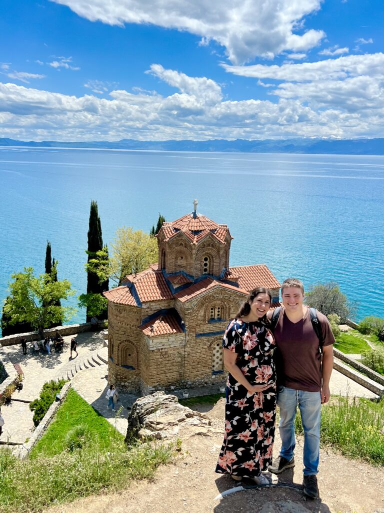kate storm and jeremy storm overlooking lake ohrid north macedonia and church of st john at kaneo on a sunny day