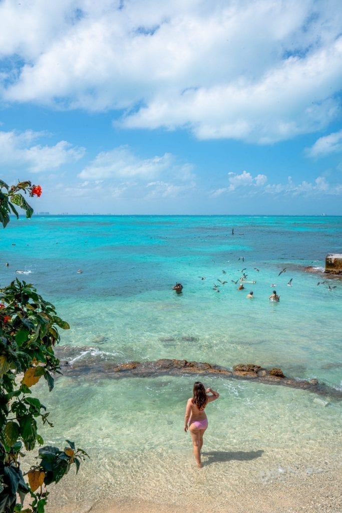 kate storm overlooking the water of isla mujeres from garrafon de castilla on an isla mujeres vacation