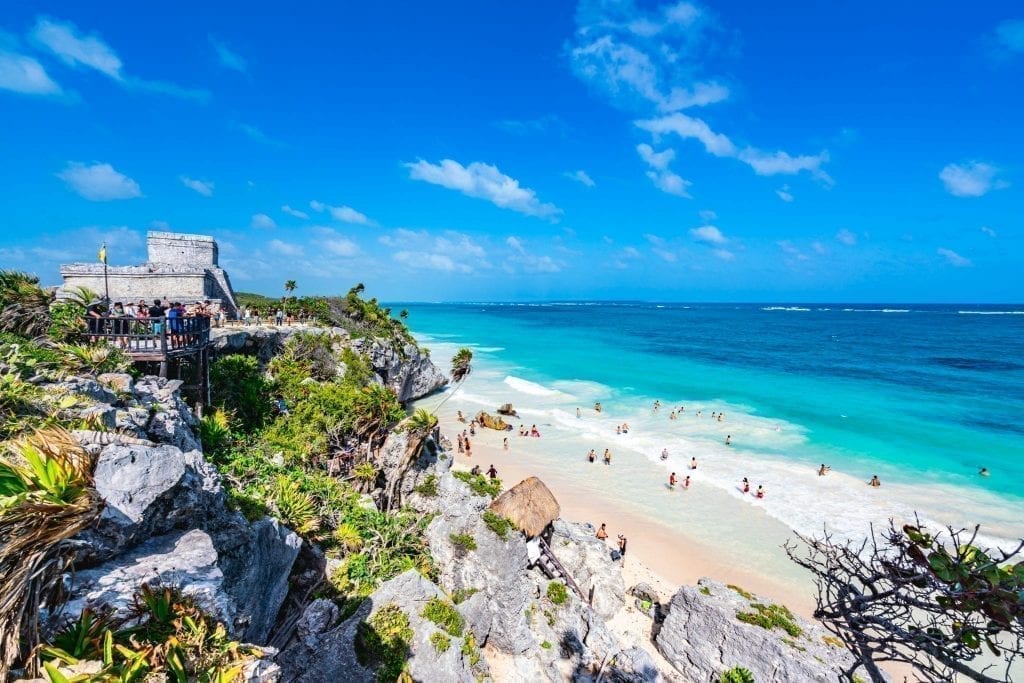 view of tulum beach and ruins from cliff above, one of the best places to visit in mexico in 2 weeks