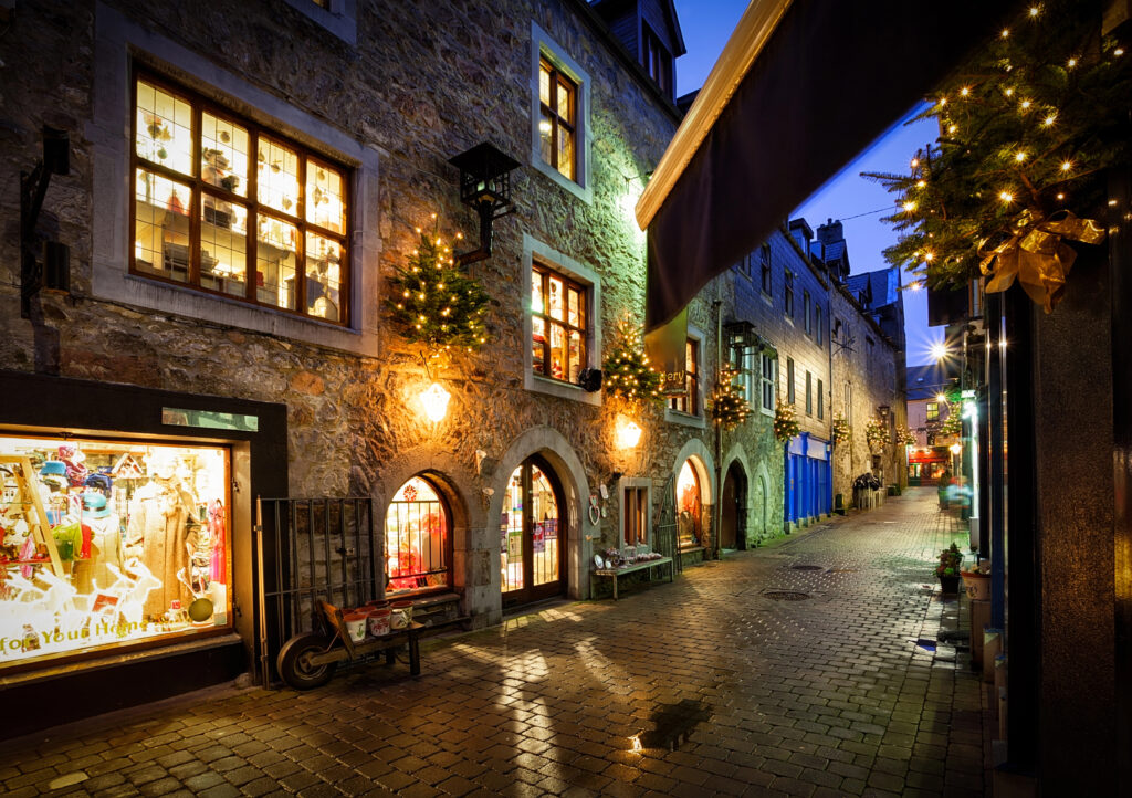 beautiful street in the historic center of galway ireland at night decorated with xmas lights