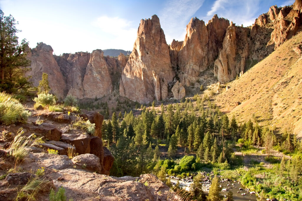jagged cliffs of smith rock state park in oregon, a fun stop on a west coast road trip itinerary