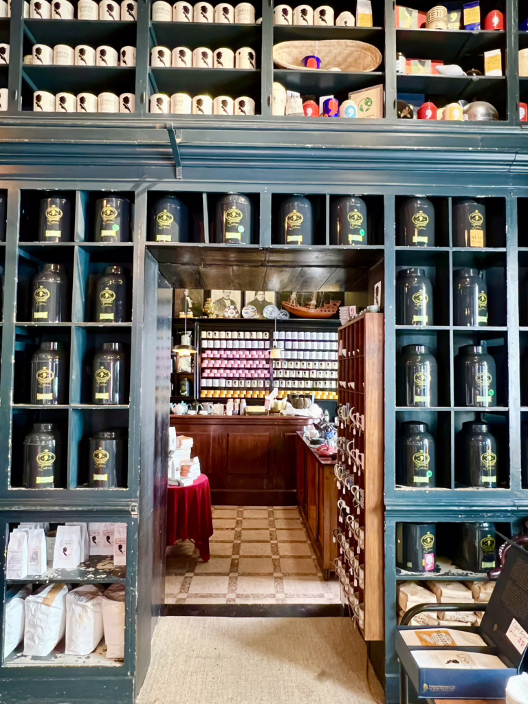 interior of lisbon portugal tea shop with vintage canisters on display