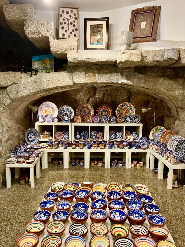 collection of ceramic dishes for sale in porto, ceramics are one of the best things to buy in portugal