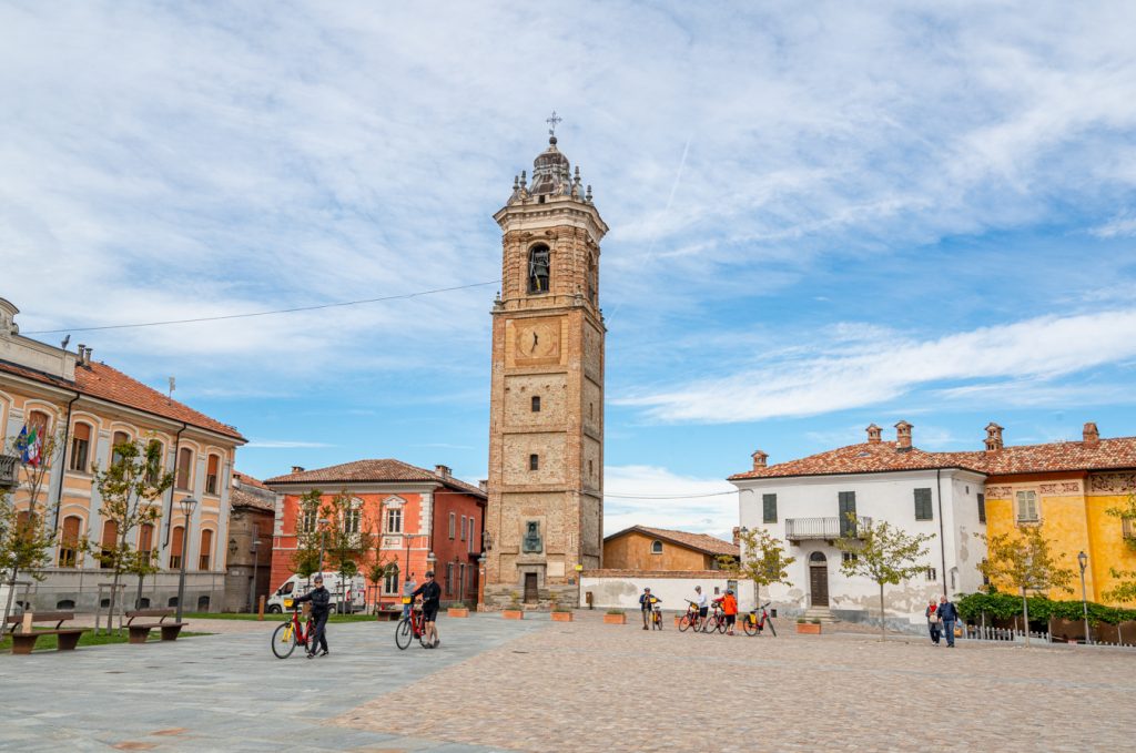 view of torre campanaria in piazza castello la morra italy