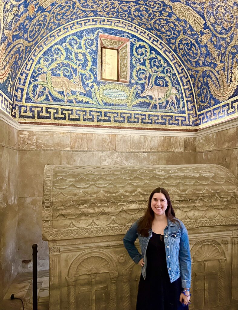 kate storm standing in front of one of the best mosaics in ravenna italy travel guide