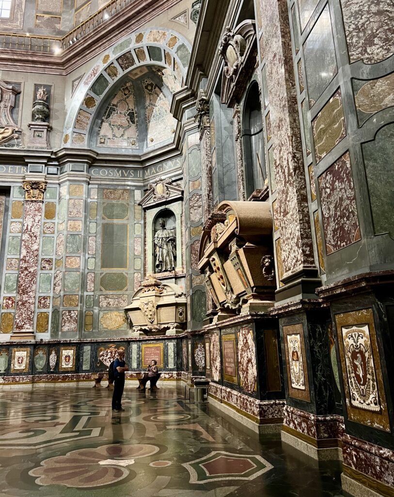 close up of marble walls and floors in medici chapel, one of the best hidden gems in florence italy
