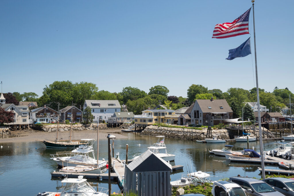 harbor of kennebunkport maine as seen from across the water on a sunny afternoon