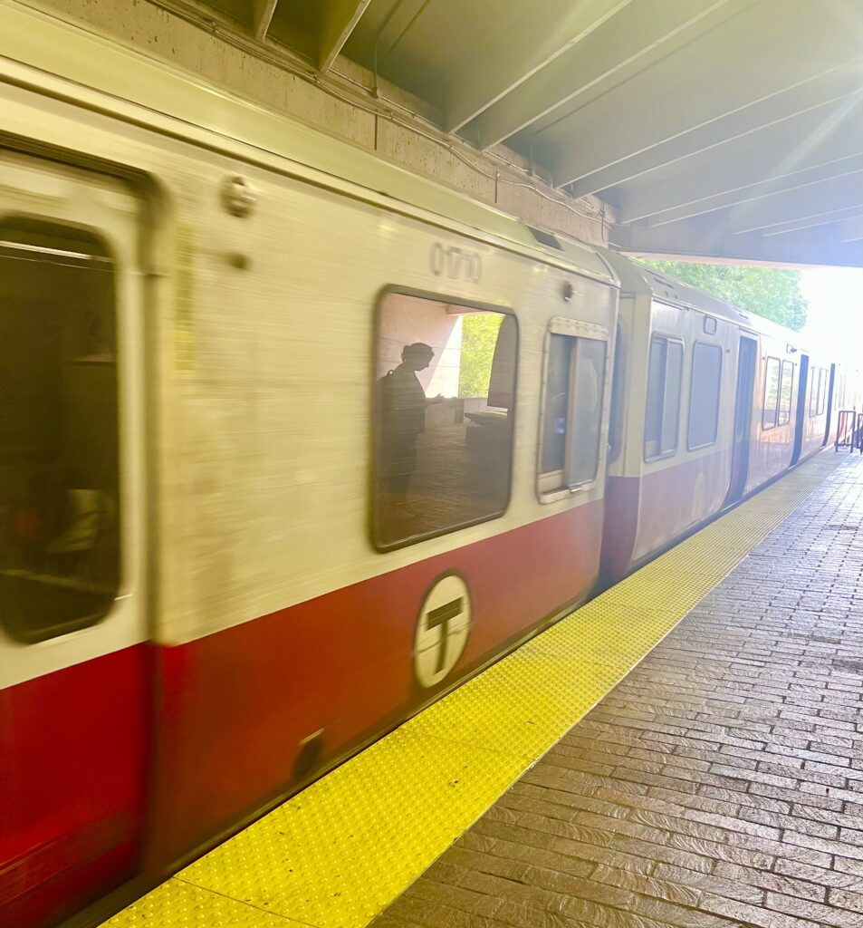 massachusetts commuter rail pulling into the station at quincy center in the greater boston area