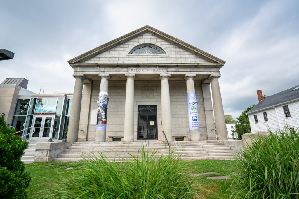 front facade of pilgrim hall featuring columns, one of the best places to visit in plymouth massachusetts