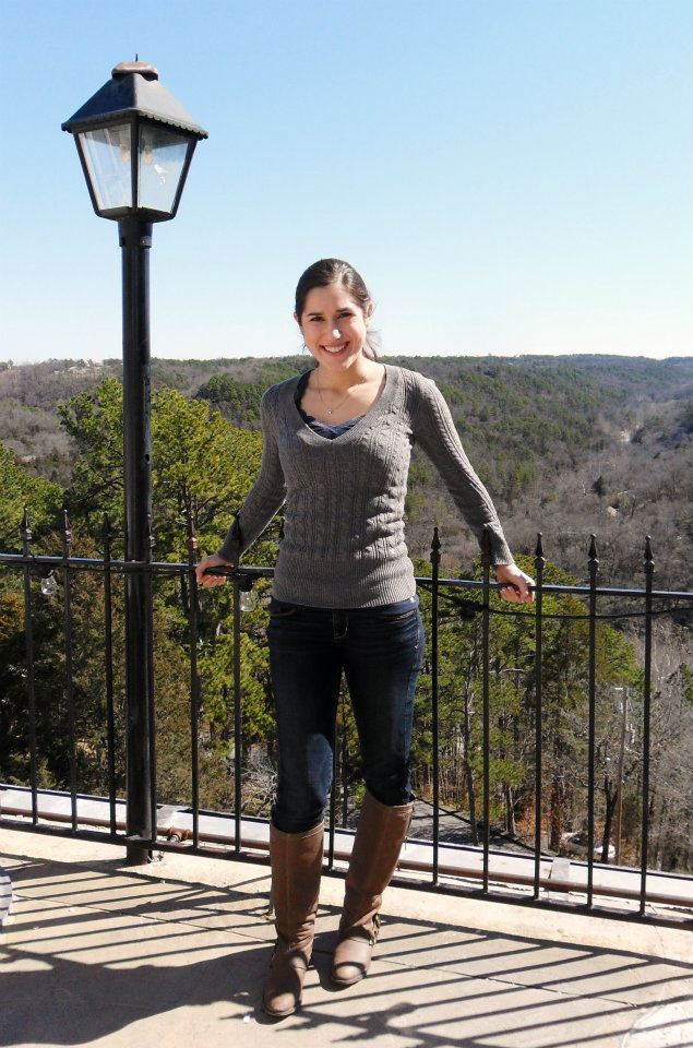 kate storm standing on the balcony of the crescent hotel in eureka springs arkansas