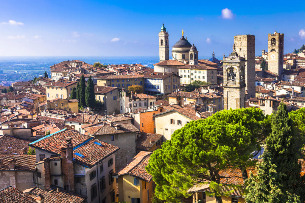 view of the skyline of bergamo italy on a sunny day, one of the most underrated cities in italy to visit