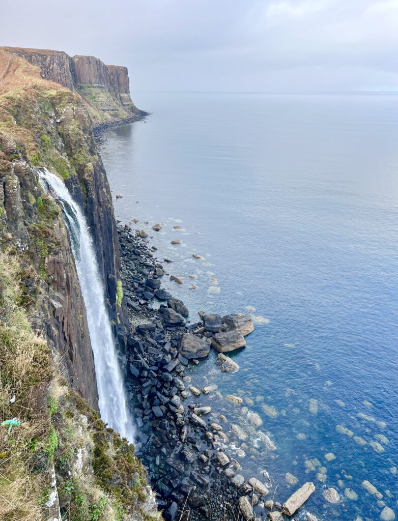 mealt falls falling into the sea next to kilt rock, one of the best things to see isle of skye scotland