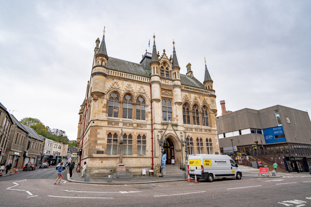inverness town house as seen from across the street on a cloudy day