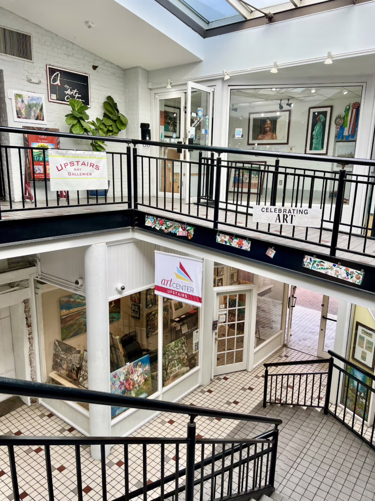 interior of art center at city market savannah ga as seen from second floor staircase