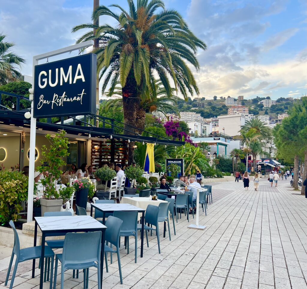 saranda promenade near sunset with restaurant visible on the left