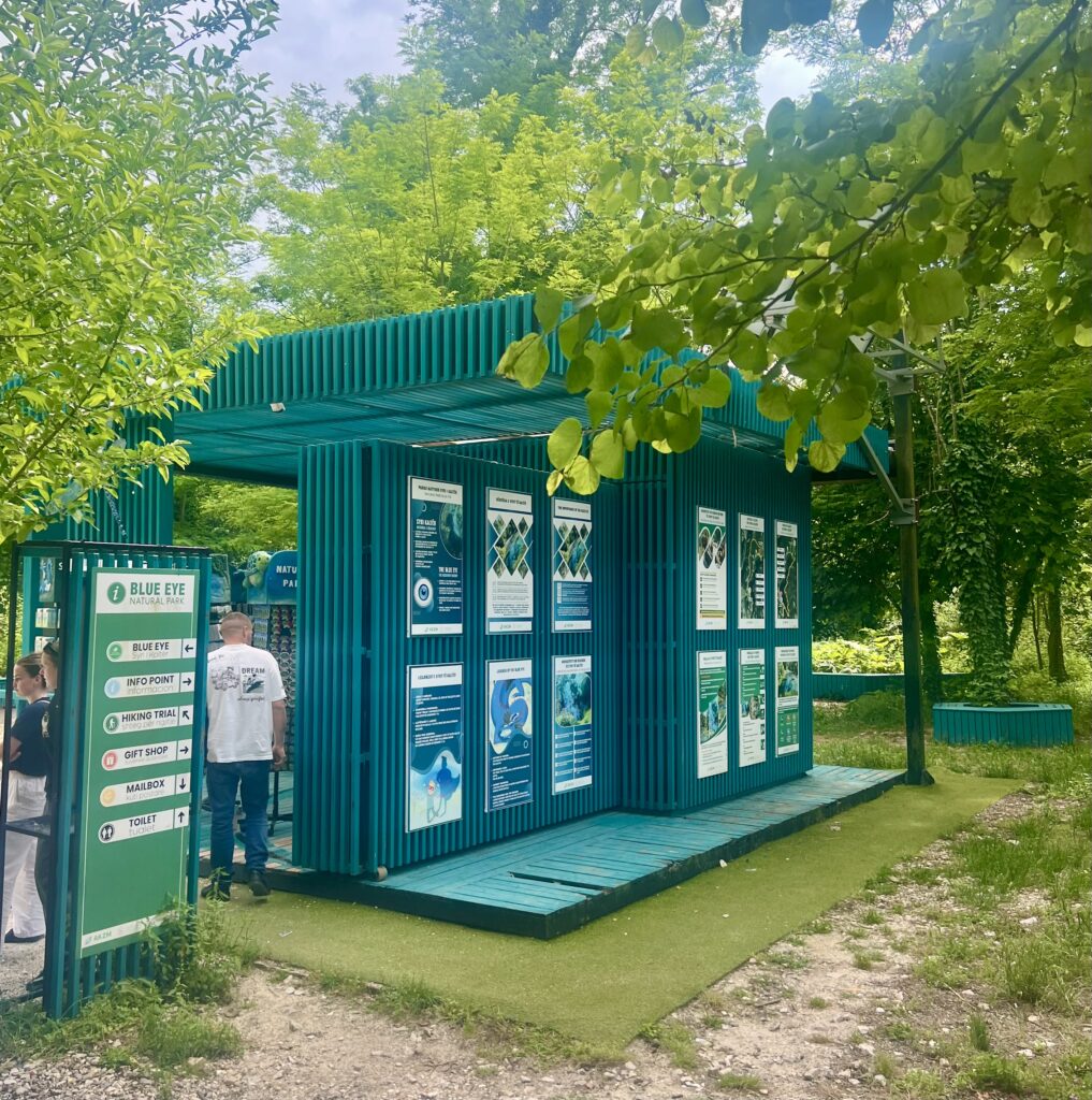 blue eye saranda information center as seen from behind