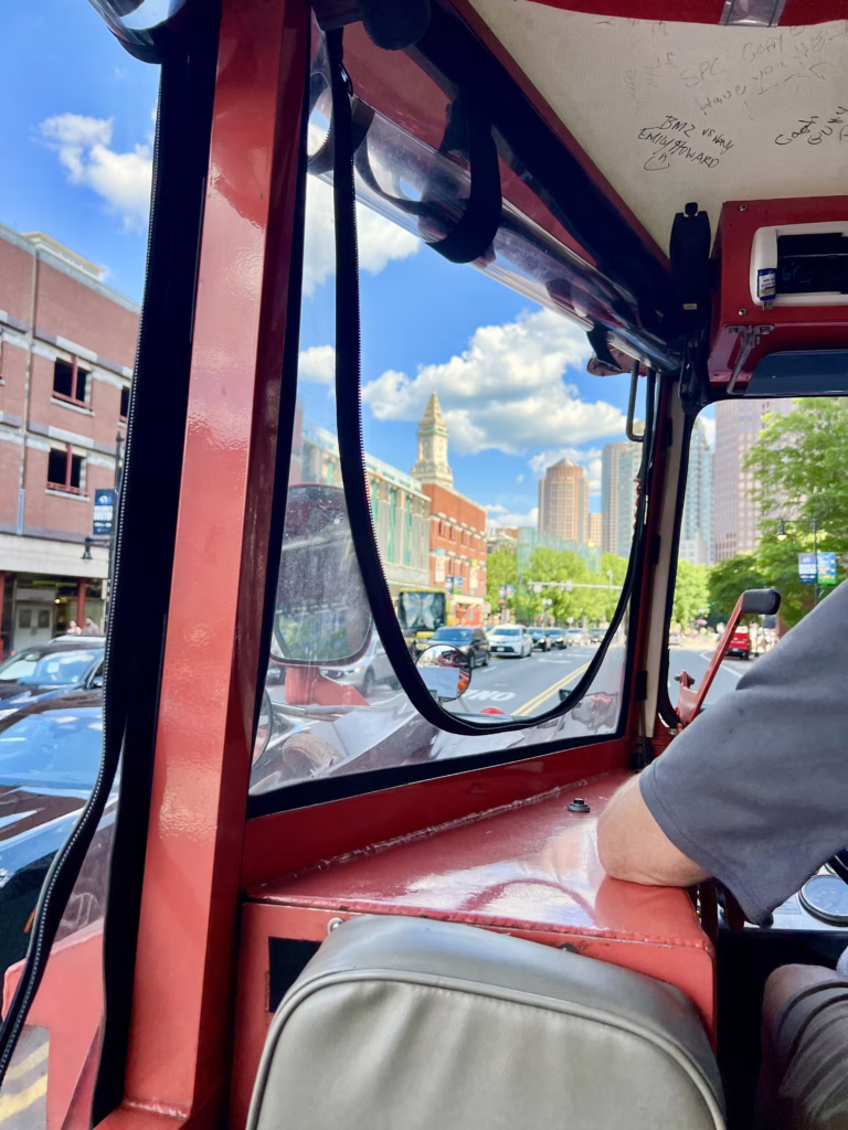 view of boston architecture through the windshield of a duck boat in boston ma