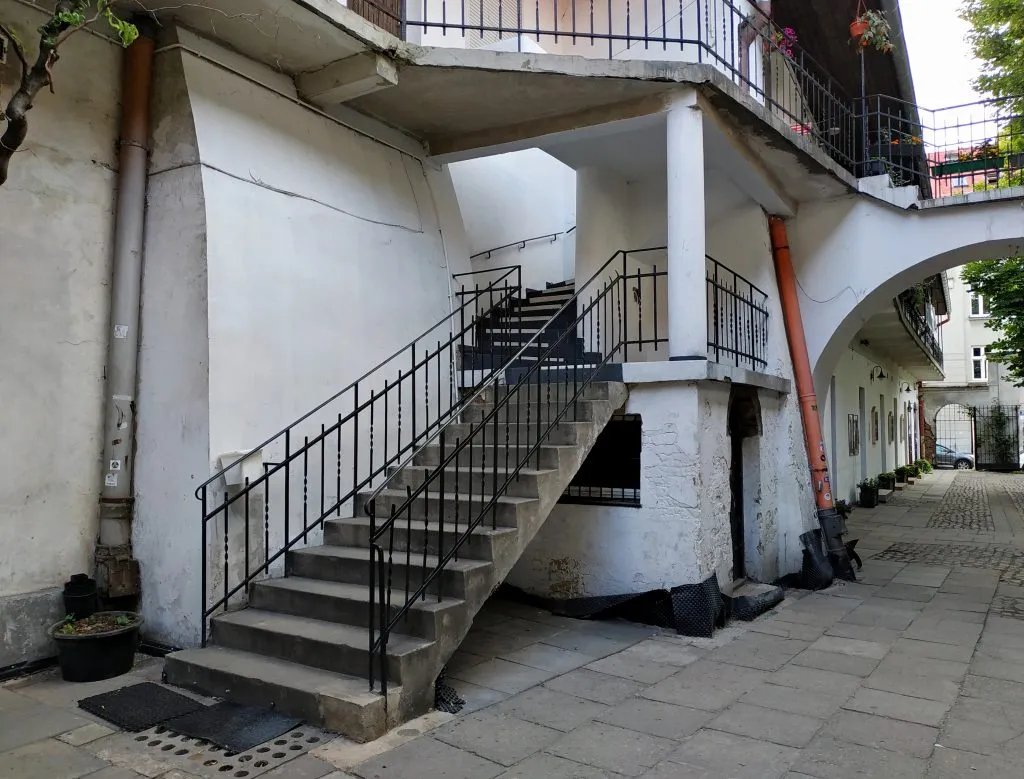 famous schindlers passage that was a filming location in krakow poland, showing staircase