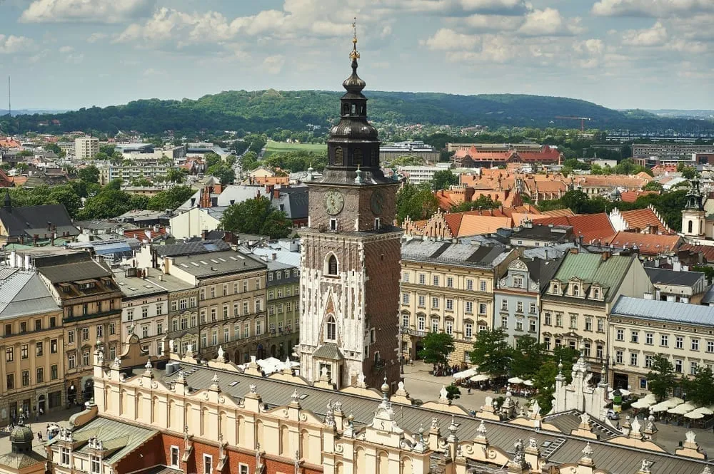 View of Town Hall Tower with Cloth Hall in the foreground in Main Market Square, one of the best things to see in Krakow Poland