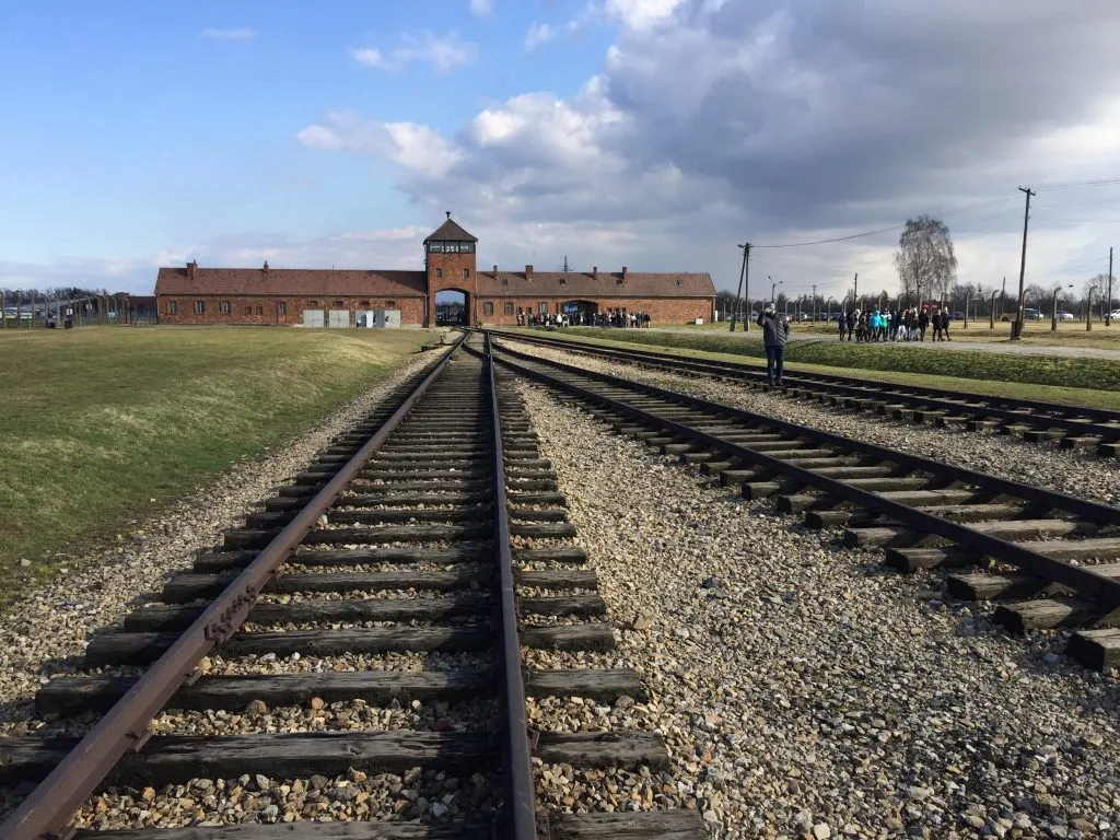 birkenau train station as seen in the distance from railroad tracks