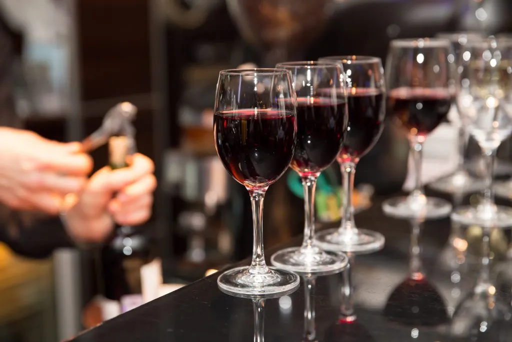 4 glasses of red wine at paris wine tasting, one of the fun things to do in paris france