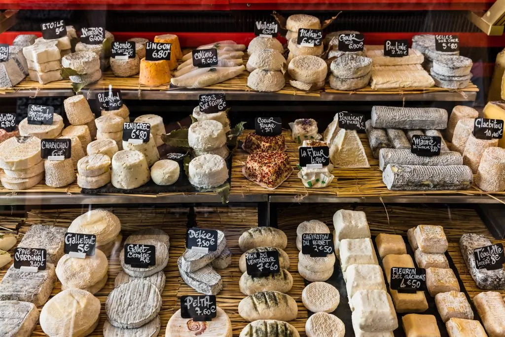 display of french cheeses in paris