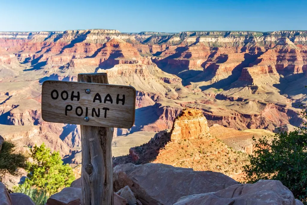 ooh aah point in grand canyon national park with wood sign in foreground