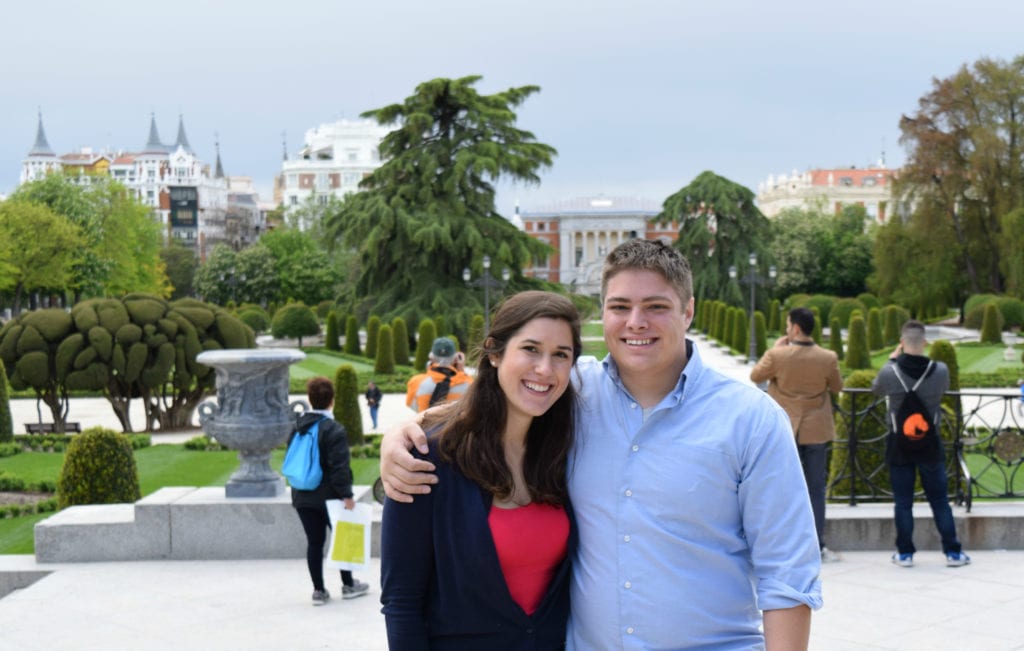 kate storm and jeremy storm in el retiro on a cloudy day while visiting madrid on a budget