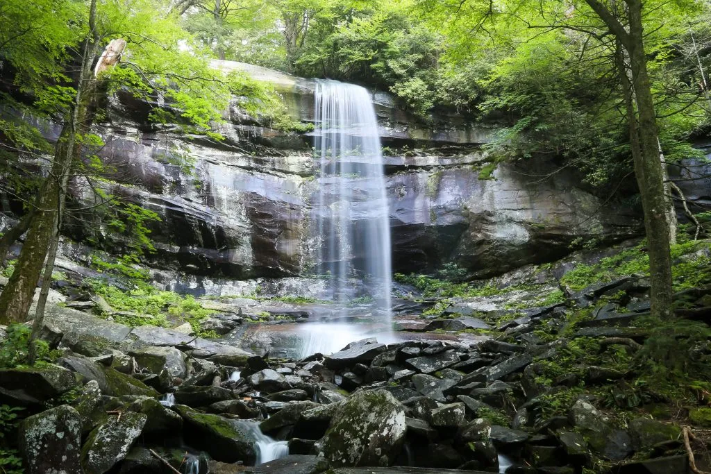 rainbow falls smoky mountains, surrounded by green foliage