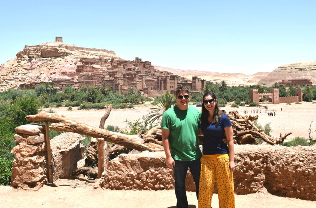 kate storm and jeremy storm in front of ait benhaddou in morocco