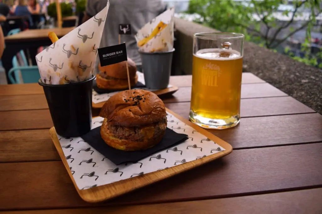 burger and beer from pops burger bar in ljubljana, part of our slovenia travel budget