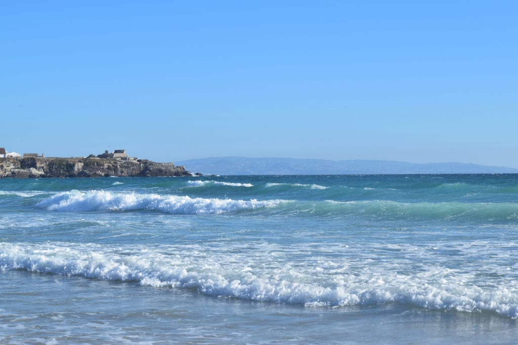 bright blue sea with waves in tarifa spain