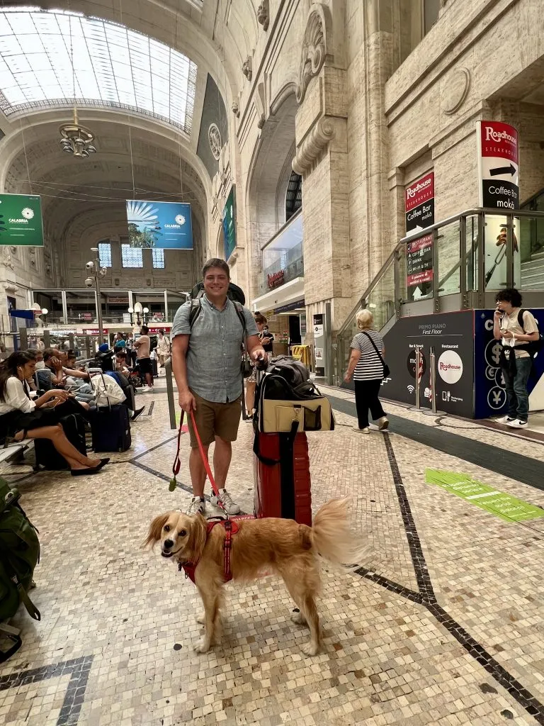 jeremy storm and ranger storm with luggage in milano centrale