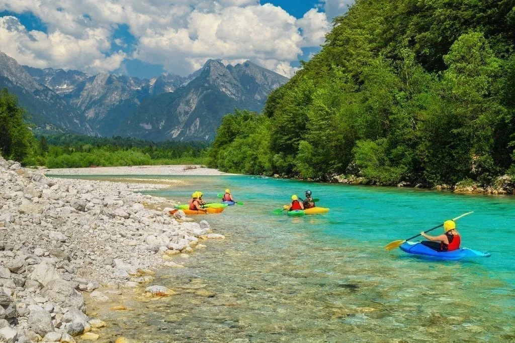 Kayakers in the Soca River in Slovenia, one of the most beautiful places in Slovenia