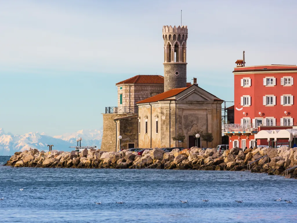 piran lighthouse as seen from across the water