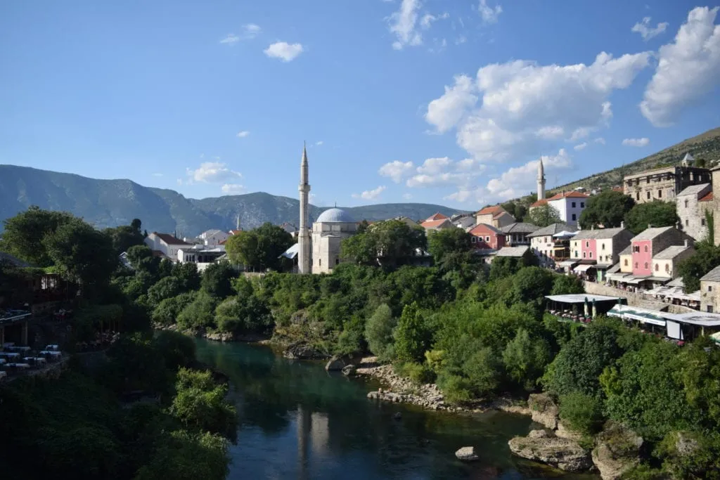 view of mostar bosnia from across the river, how to use airbnb can come in handy in the balkans