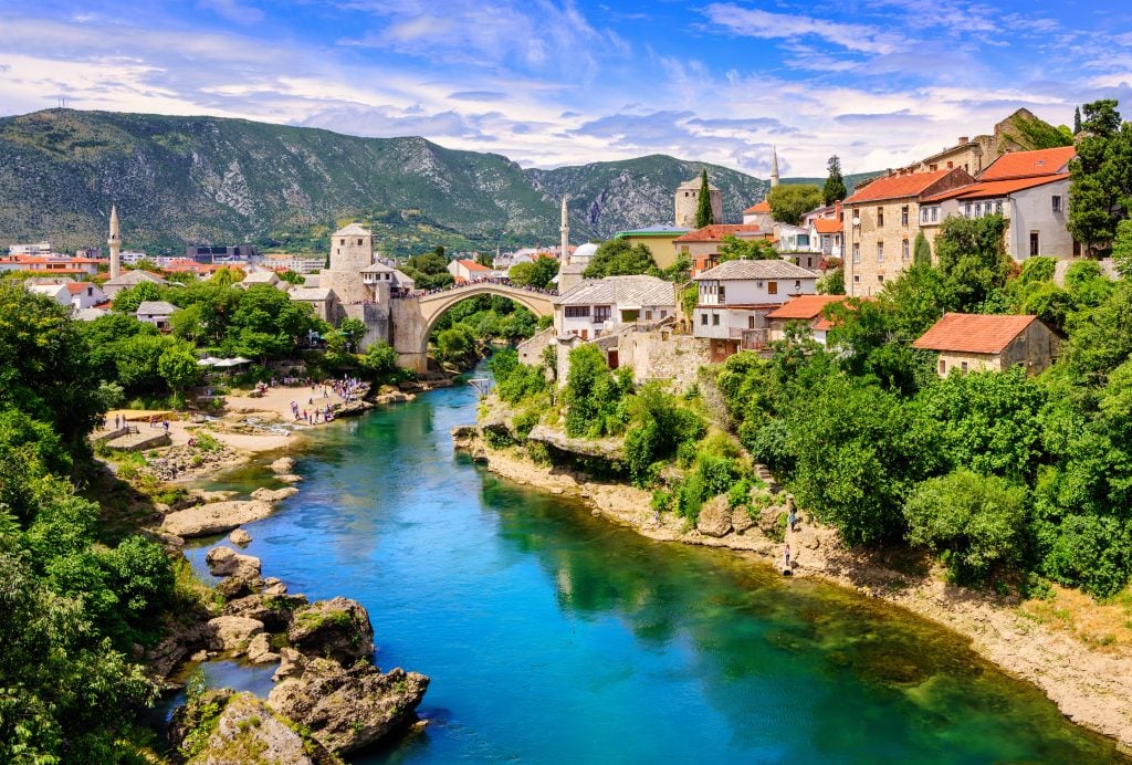 view of stari most and old town mostar in one day