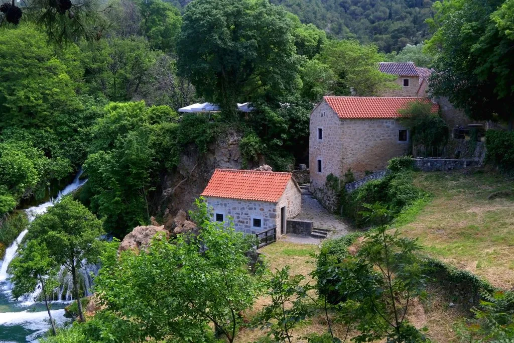 view of traditional stone watermill in krka national park croatia waterfall park