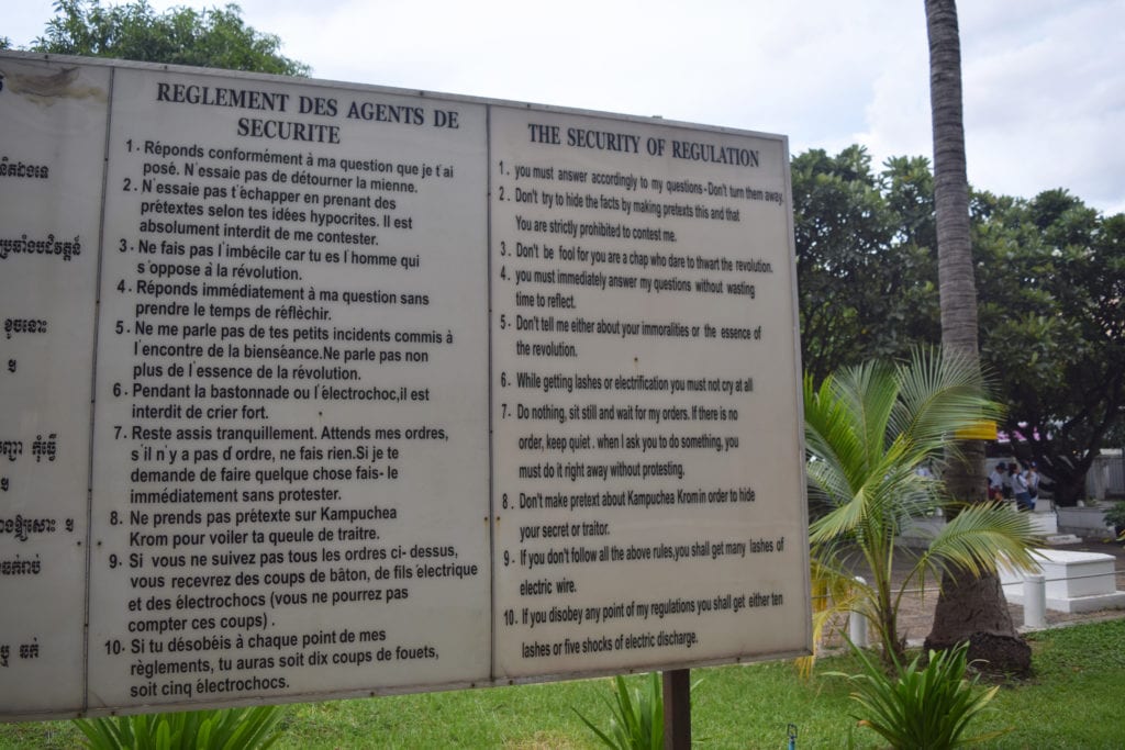 sign denoting inhumane rules for prisoners at tuol sleng genocide museum 