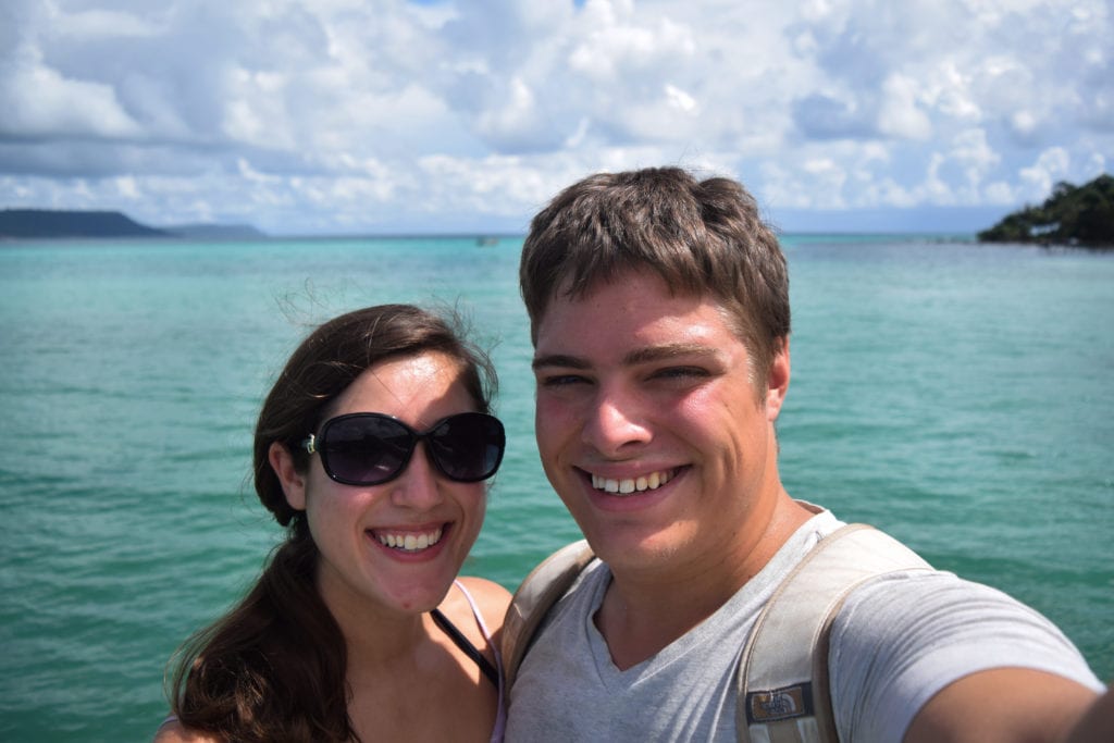 kate storm and jeremy storm taking a selfie at the beach on koh rong island