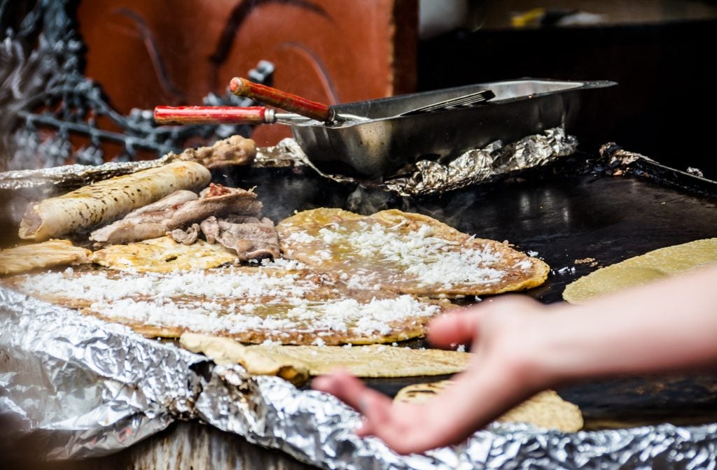 street tacos being prepared in mexico city